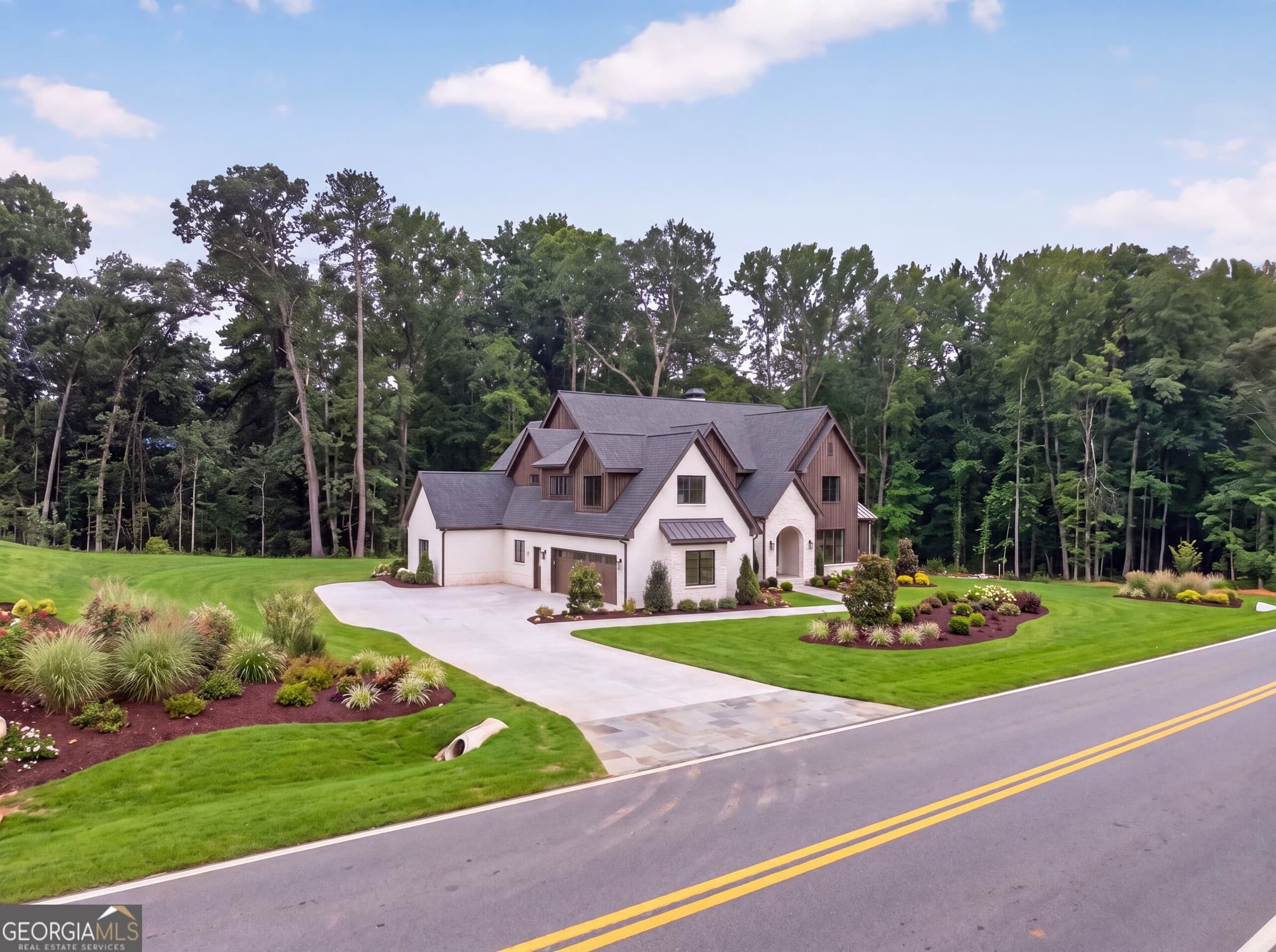 5 bedroom, 4.5 bathroom, 5,799 sq ft single family residence for sale at 616 Hoke Okelly Mill Road, Loganville, GA 30052 — photo 5