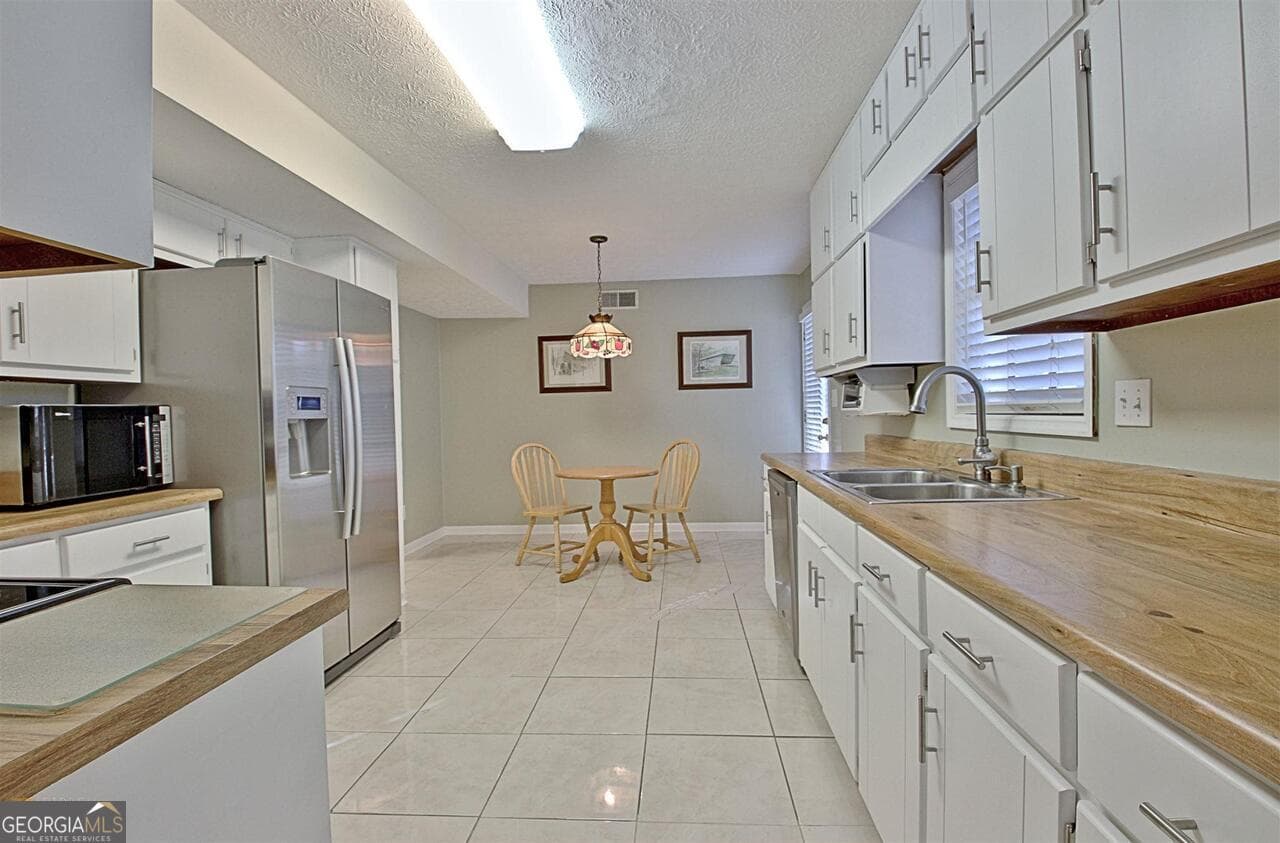 4 bedroom, 2.5 bathroom, 1,856 sq ft single family residence for rent at 119 Terrace Tay, Peachtree City, GA 30269 for $3,100 a month — photo 4