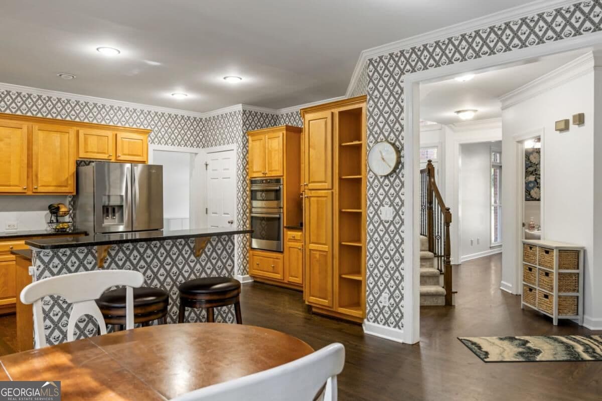 4 bedroom, 3.5 bathroom, 3,418 sq ft single family residence for sale at 720 Vinings Estates Drive, Smyrna, GA 30126 — photo 8