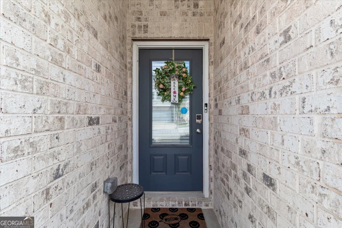 3 bedroom, 2.5 bathroom, 1,811 sq ft condominium for sale at 7503 Knoll Hollow Road, Lithonia, GA 30058 — photo 4