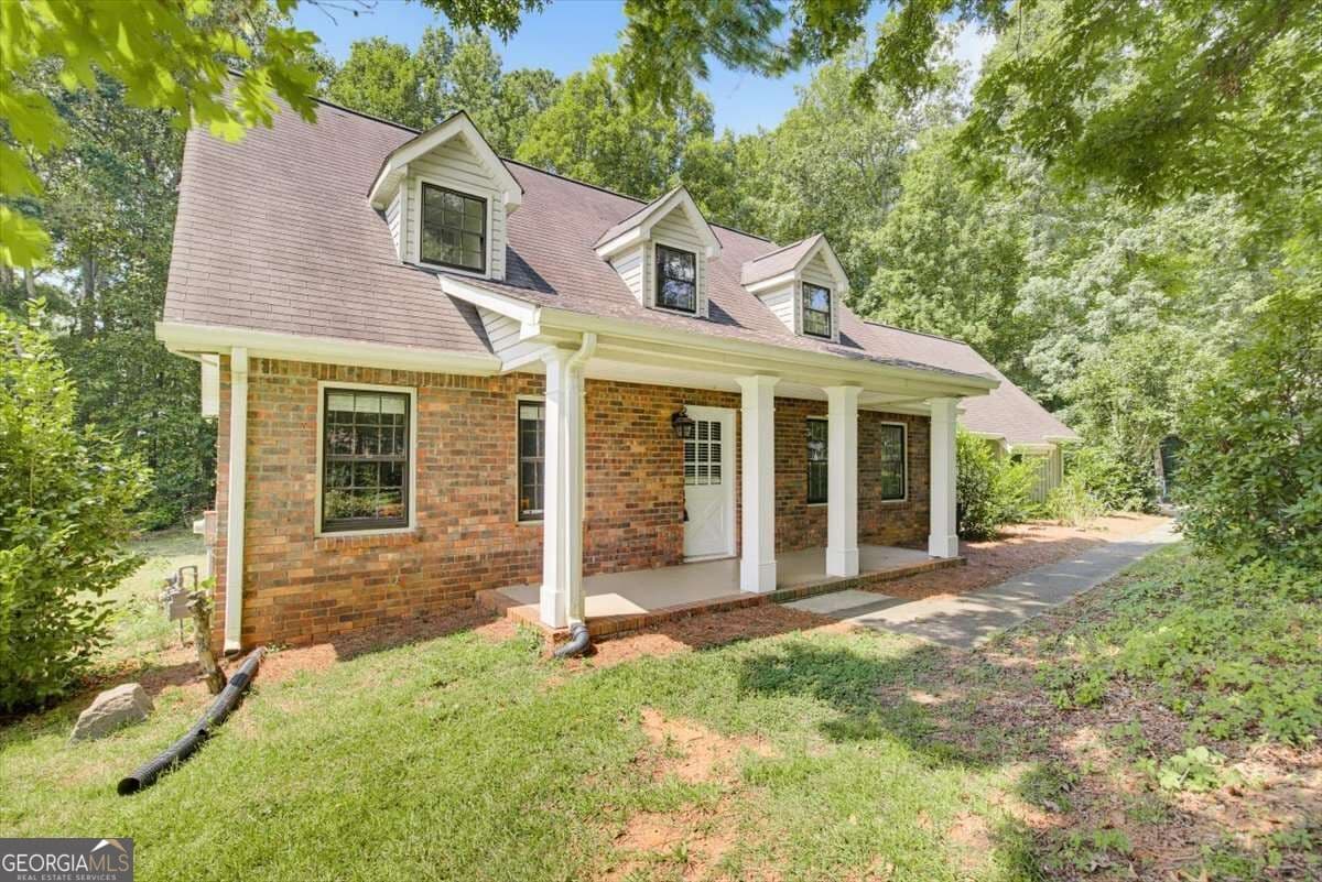 4 bedroom, 2.5 bathroom, 2,057 sq ft single family residence for sale at 435 NW Stonehenge Drive, Marietta, GA 30064 — photo 1 of 36