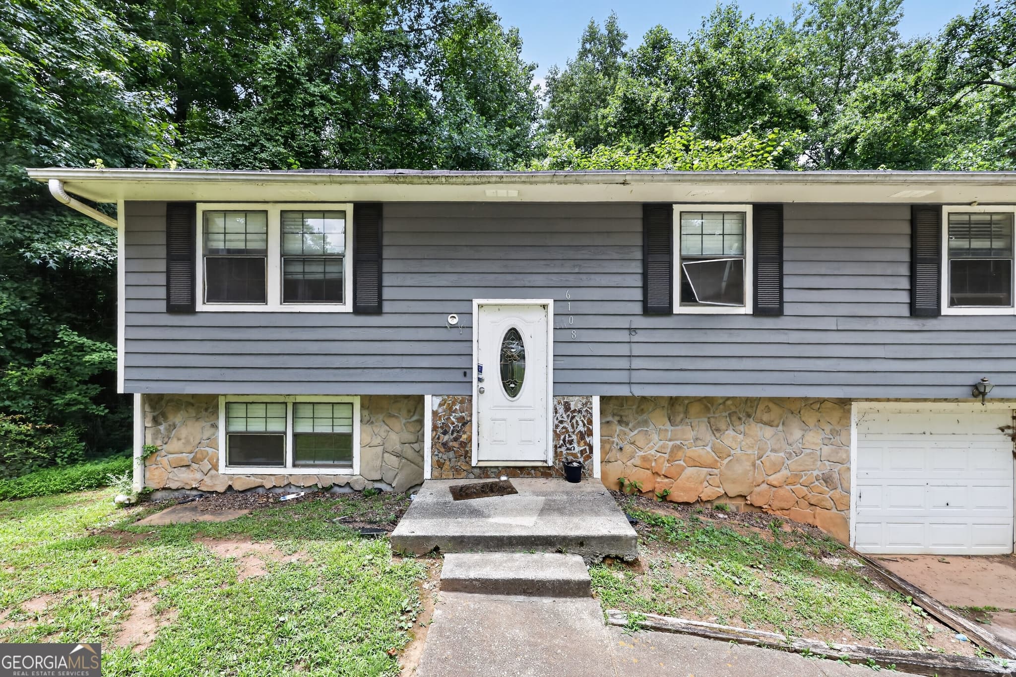 4 bedroom, 2 bathroom, 1,392 sq ft single family residence for sale at 6108 Cherokee Valley Way, Lithonia, GA 30058 — photo 6