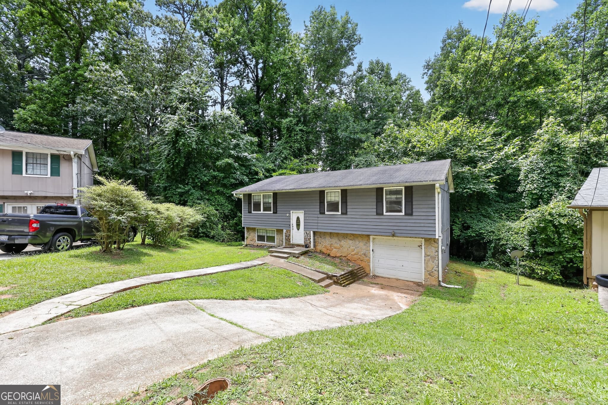 4 bedroom, 2 bathroom, 1,392 sq ft single family residence for sale at 6108 Cherokee Valley Way, Lithonia, GA 30058 — photo 5
