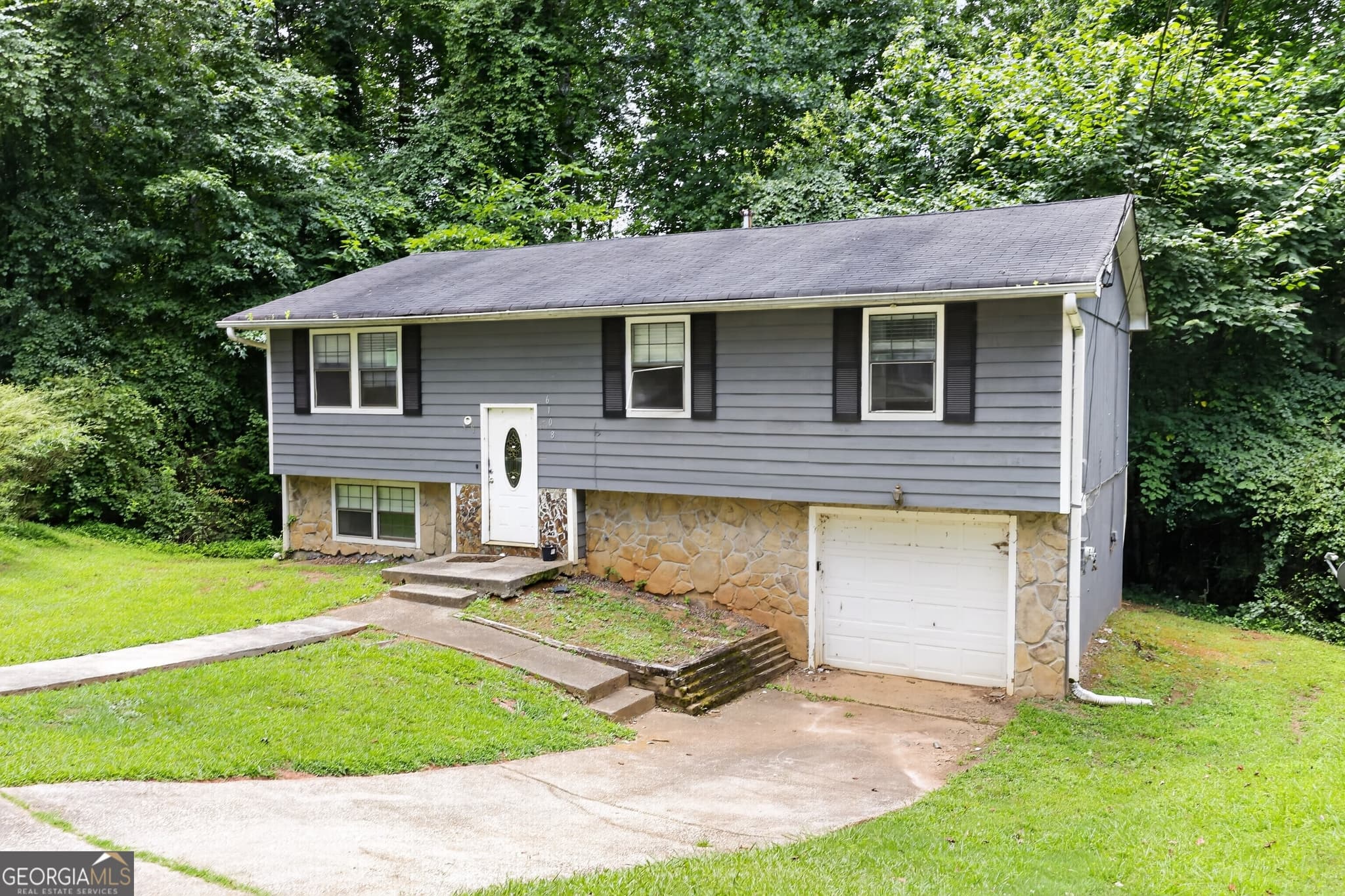 4 bedroom, 2 bathroom, 1,392 sq ft single family residence for sale at 6108 Cherokee Valley Way, Lithonia, GA 30058 — photo 10