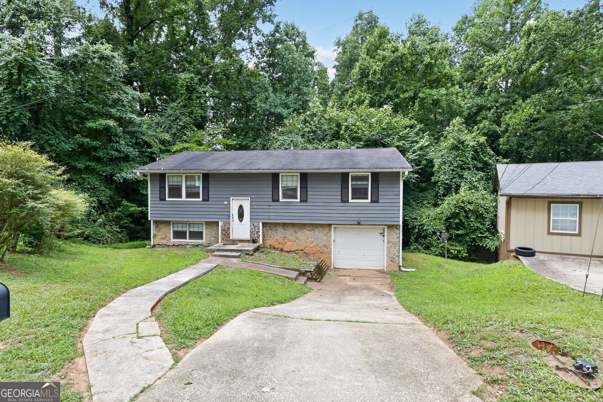4 bedroom, 2 bathroom, 1,392 sq ft single family residence for sale at 6108 Cherokee Valley Way, Lithonia, GA 30058 — photo 8
