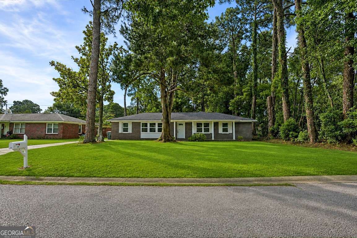 4 bedroom, 2 bathroom, 1,593 sq ft single family residence for sale at 206 Paradise Drive, Savannah, GA 31406 — photo 3