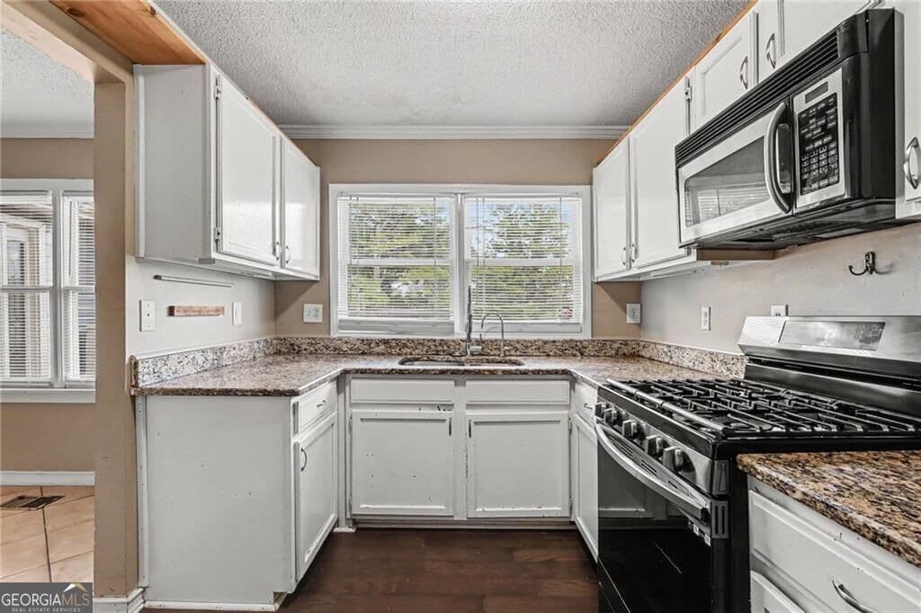 4 bedroom, 3 bathroom, 1,967 sq ft single family residence for sale at 2663 Jewel Street, Atlanta, GA 30344 — photo 8