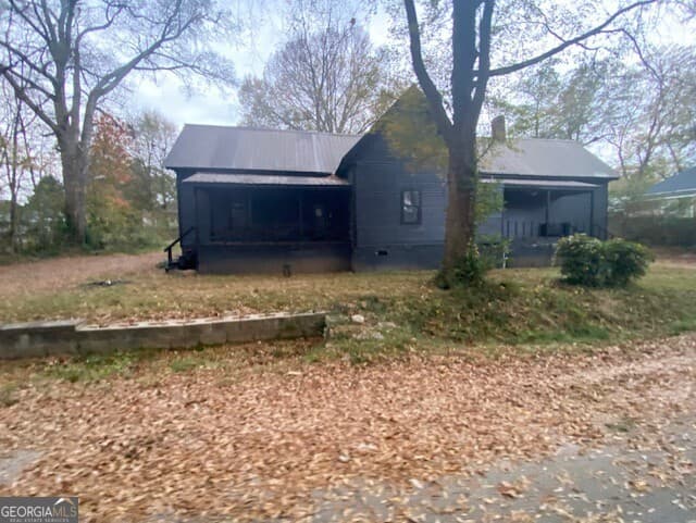 4 bedroom, 2 bathroom, 1,840 sq ft single family residence for sale at 6114 Hopkins Street, Covington, GA 30014