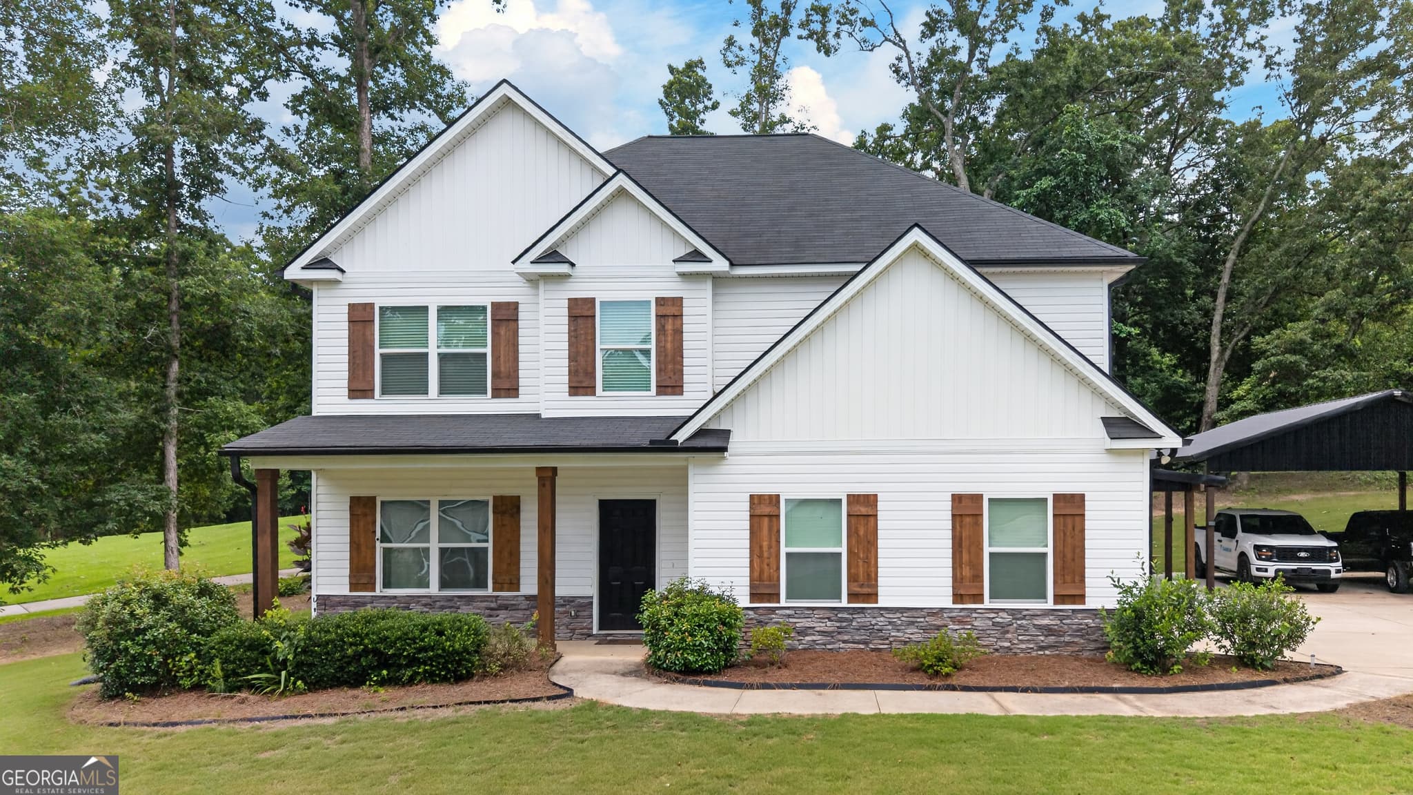 5 bedroom, 3 bathroom, 2,716 sq ft single family residence for sale at 207 Dixon Circle, Williamson, GA 30292 — photo 4