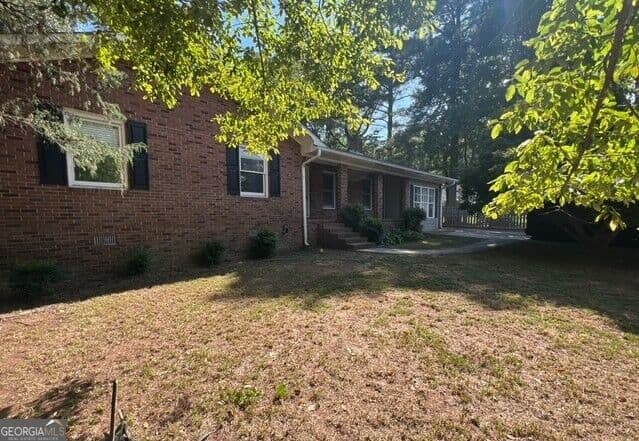 4 bedroom, 2 bathroom, 1,980 sq ft single family residence for sale at 1710 Rosewood Drive, Griffin, GA 30223