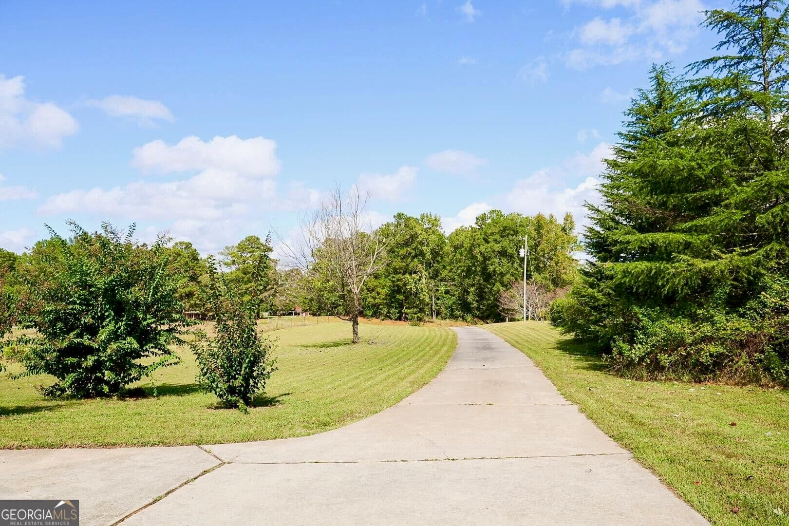 5 bedroom, 3.5 bathroom, 3,150 sq ft single family residence for sale at 2454 Adams Road, The Rock, GA 30285 — photo 2
