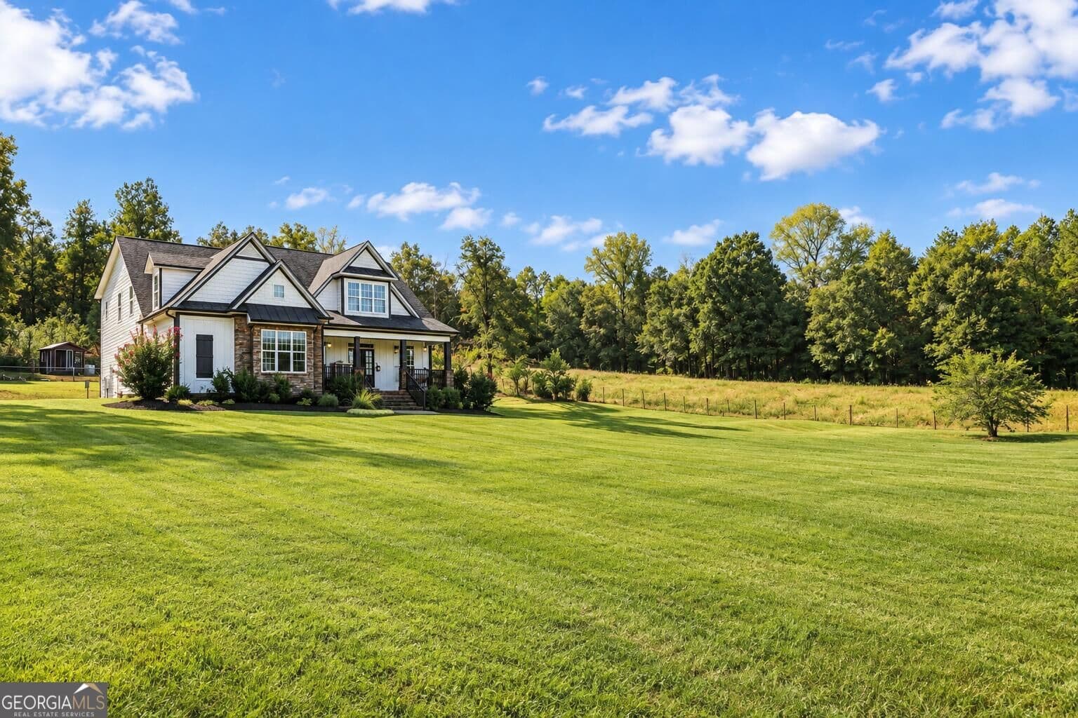 5 bedroom, 3.5 bathroom, 3,150 sq ft single family residence for sale at 2454 Adams Road, The Rock, GA 30285