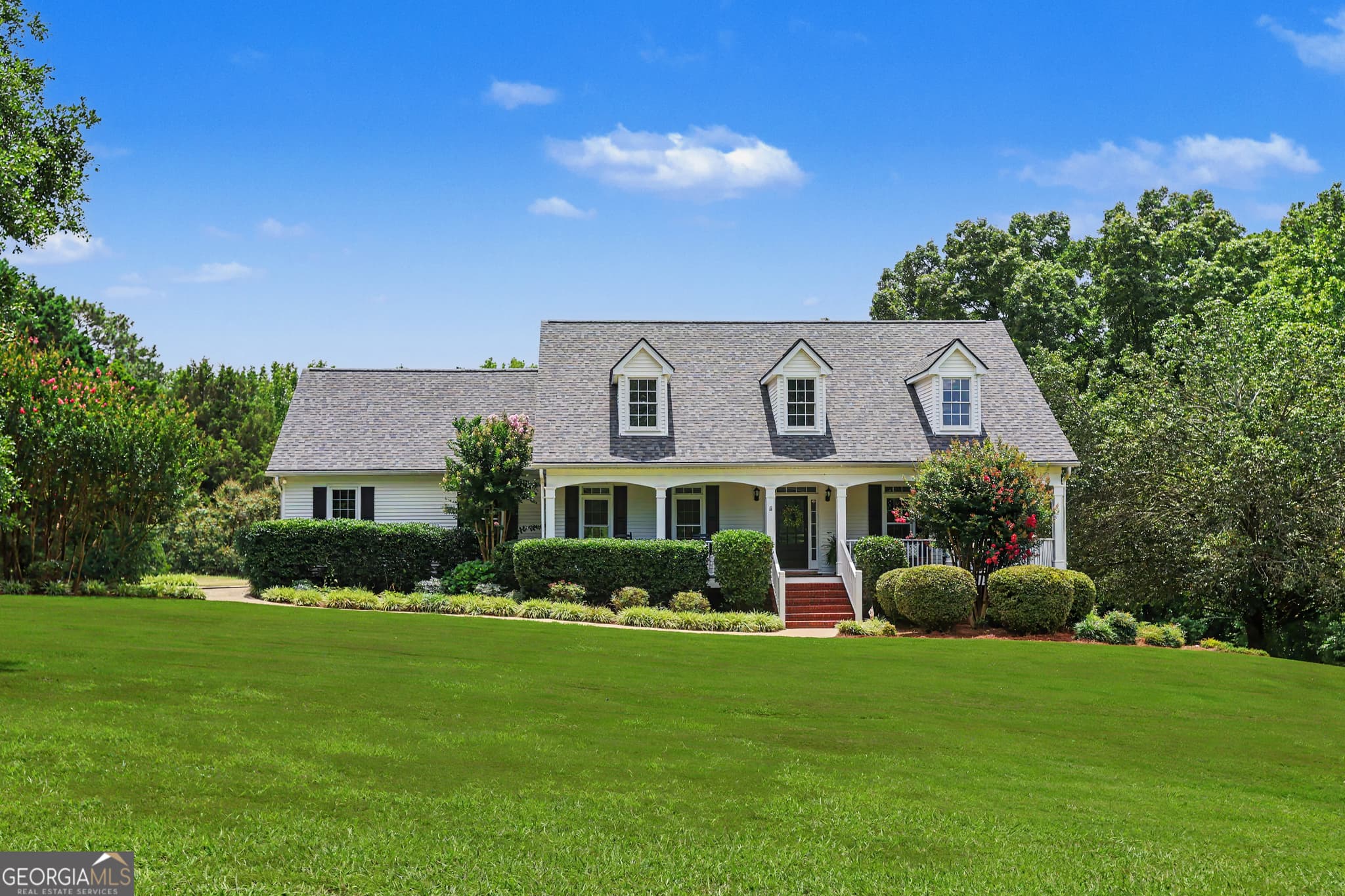 5 bedroom, 3.5 bathroom, 5,120 sq ft single family residence for sale at 1825 Skelton Road, Hoschton, GA 30548 — photo 2
