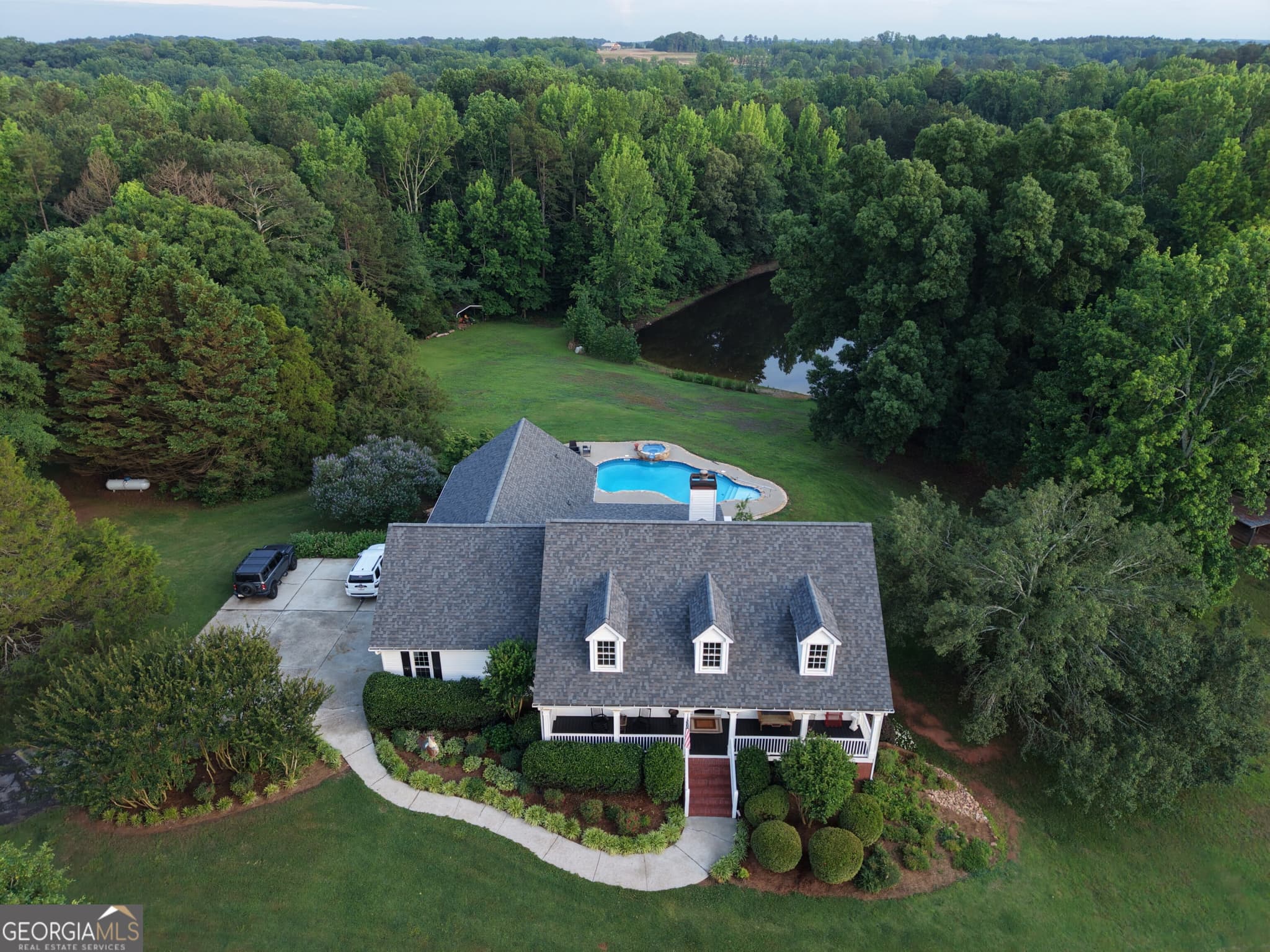 5 bedroom, 3.5 bathroom, 5,120 sq ft single family residence for sale at 1825 Skelton Road, Hoschton, GA 30548 — photo 1 of 69