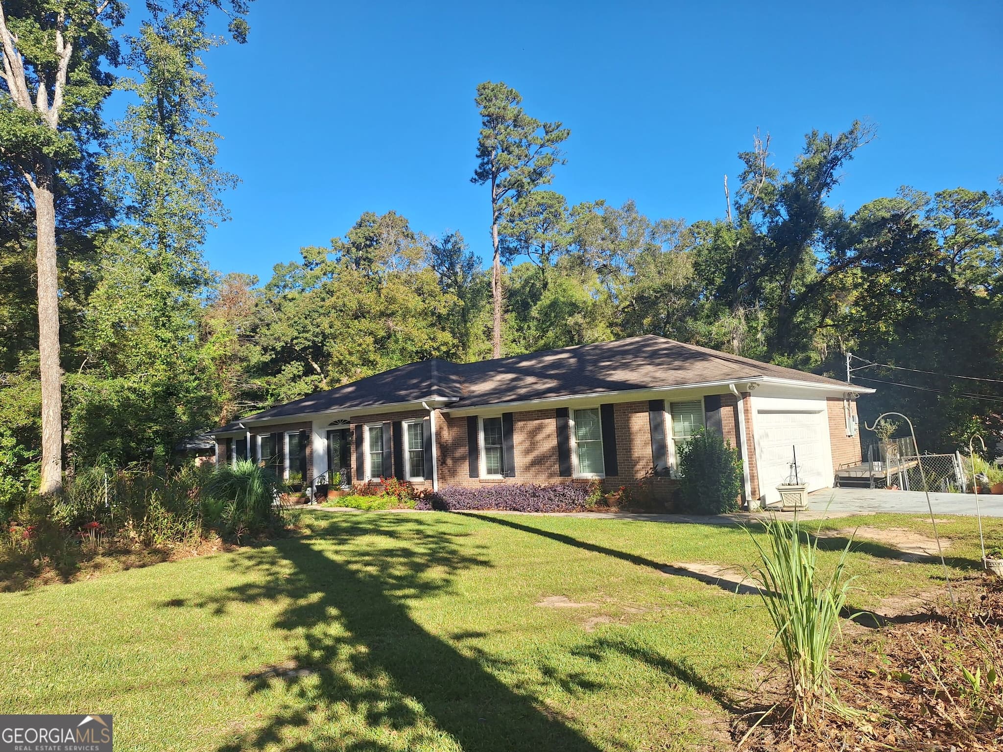4 bedroom, 3 bathroom, 2,975 sq ft single family residence for sale at 4909 Wesleyan Woods Drive, Macon, GA 31210 — photo 2