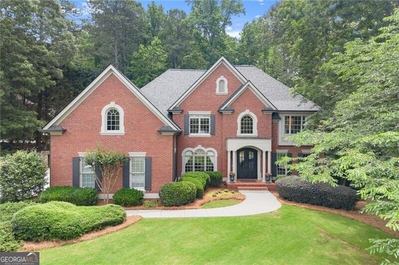 6 bedroom, 6 bathroom, 6,229 sq ft single family residence sold at 701 Hallbrook Court, Alpharetta, GA 30004