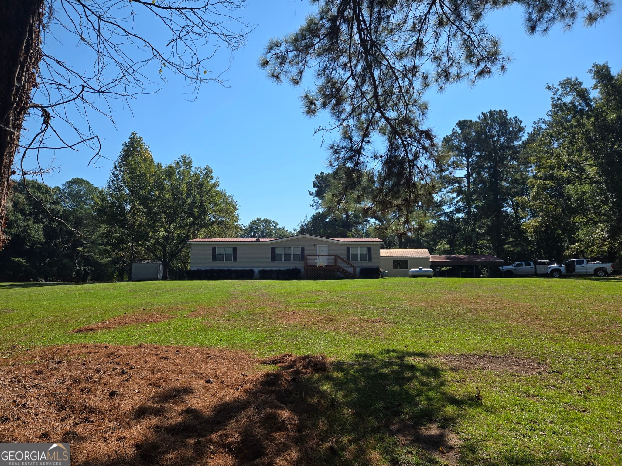 3 bedroom, 2 bathroom manufactured home,single family residence for sale at 795 S Main Street, Davisboro, GA 31018 — photo 2