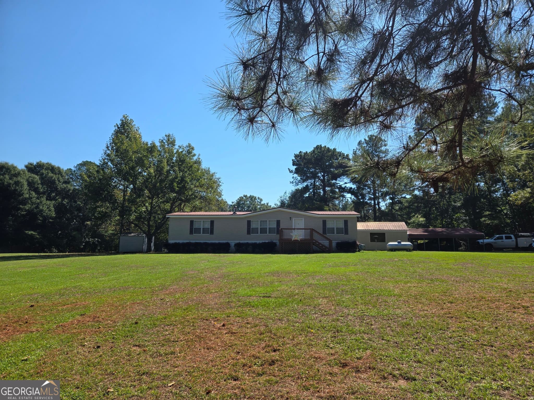 3 bedroom, 2 bathroom manufactured home,single family residence for sale at 795 S Main Street, Davisboro, GA 31018 — photo 5