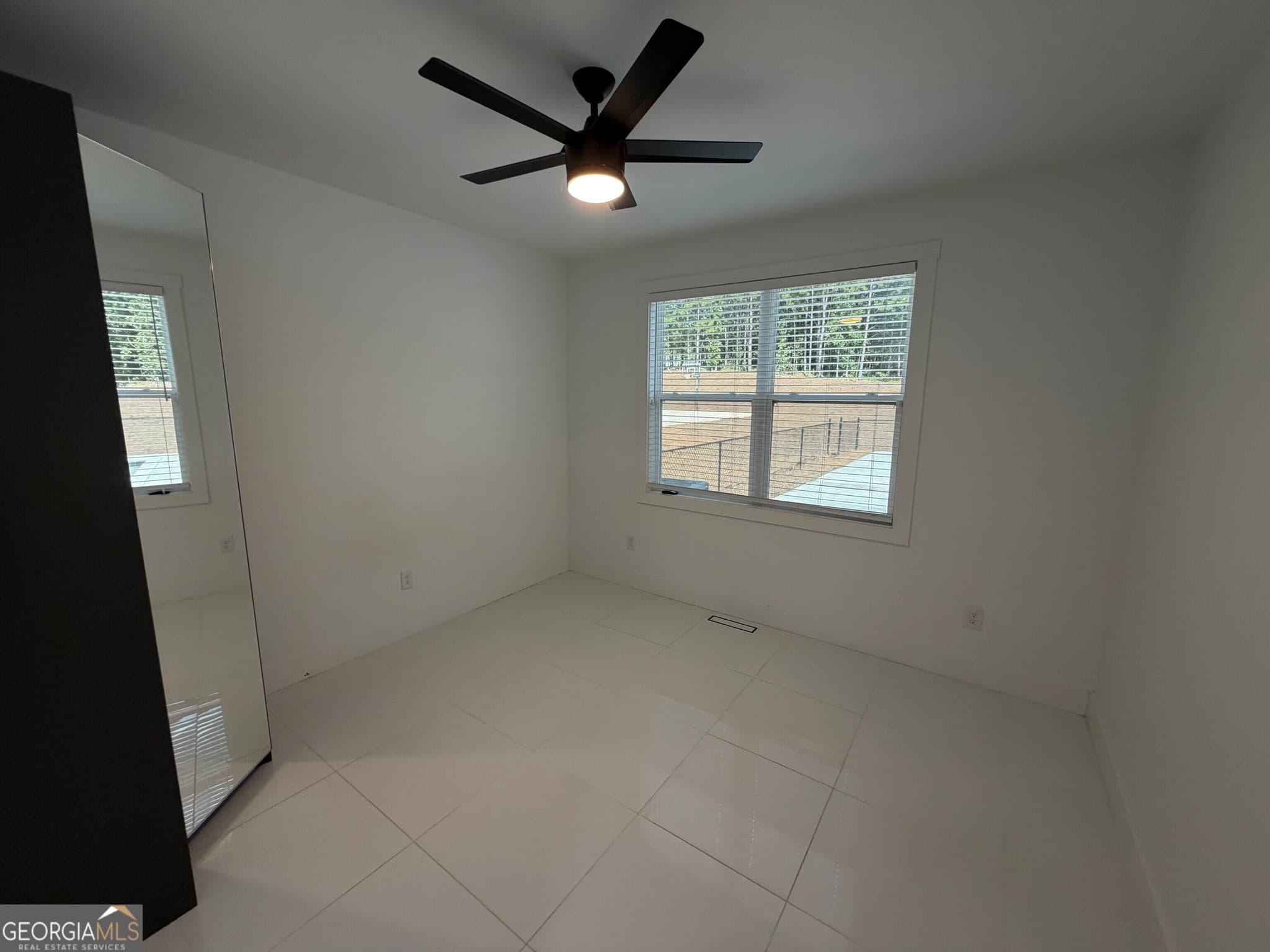 5 bedroom, 3.5 bathroom, 4,517 sq ft single family residence for sale at 214 Coastline Road, Fayetteville, GA 30214 — photo 10