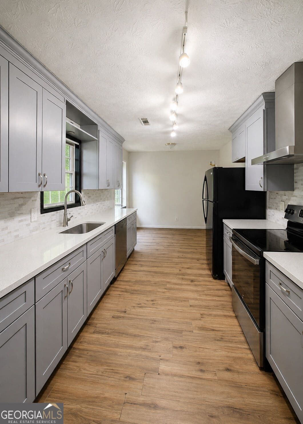 4 bedroom, 3 bathroom, 1,213 sq ft single family residence for sale at 1758 Eric Circle, Lawrenceville, GA 30043 — photo 3