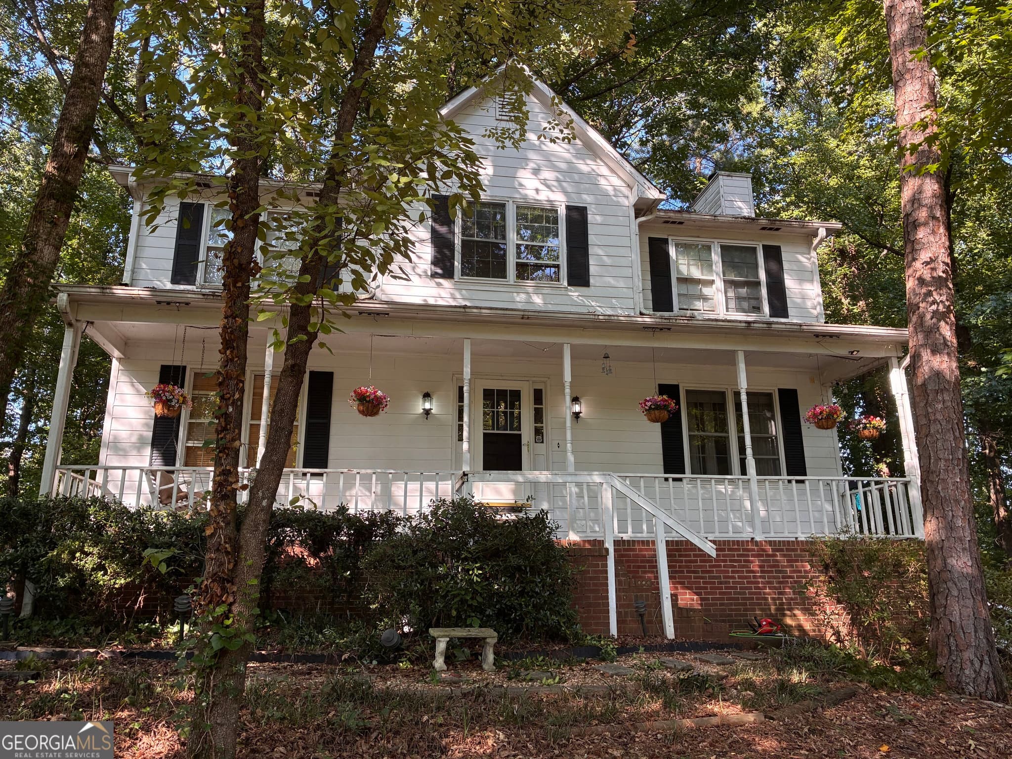 4 bedroom, 4.5 bathroom, 2,538 sq ft single family residence for sale at 1026 Knotts Pointe Drive, Woodstock, GA 30188 — photo 1 of 20