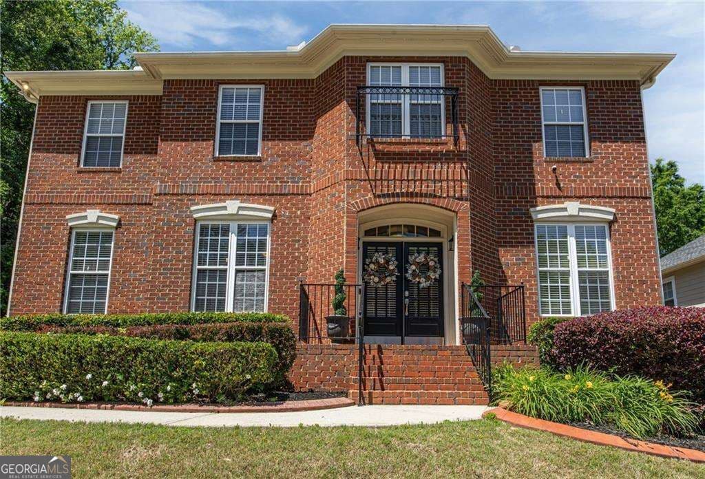 4 bedroom, 3.5 bathroom, 2,914 sq ft single family residence for sale at 3482 Walnut Ridge, Atlanta, GA 30349 — photo 2