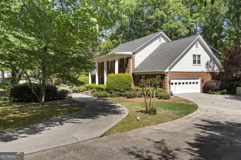7 bedroom, 6.5 bathroom, 5,176 sq ft single family residence for sale at 1780 Brandon Hall Drive, Atlanta, GA 30350 — photo 3