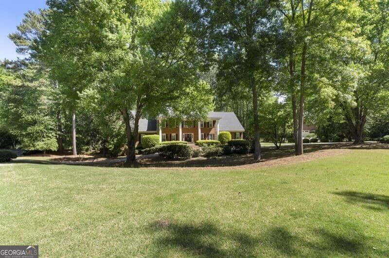 7 bedroom, 6.5 bathroom, 5,176 sq ft single family residence for sale at 1780 Brandon Hall Drive, Atlanta, GA 30350