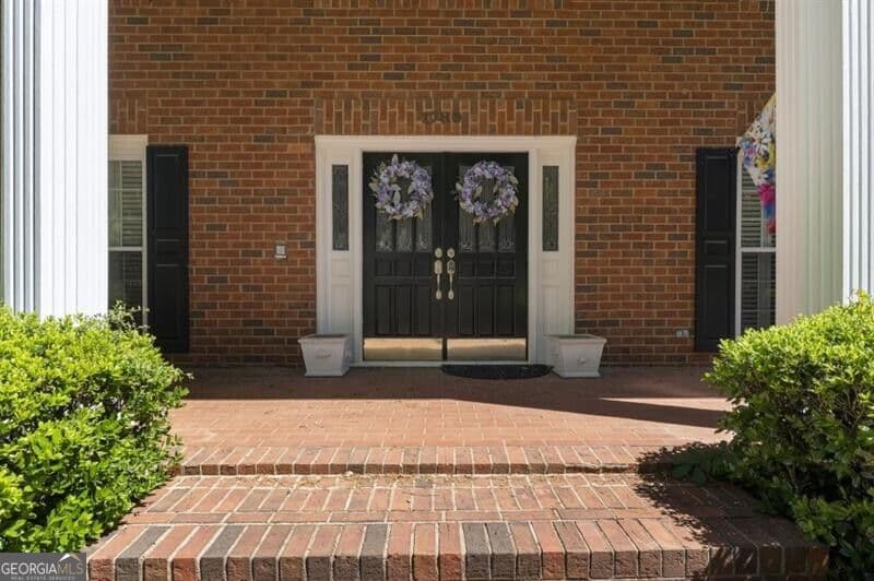 7 bedroom, 6.5 bathroom, 5,176 sq ft single family residence for sale at 1780 Brandon Hall Drive, Atlanta, GA 30350 — photo 4