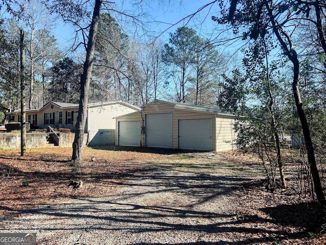 3 bedroom, 2 bathroom, 1,800 sq ft manufactured home,single family residence for sale at 156 Flatrock Road, Eatonton, GA 31024 — photo 2