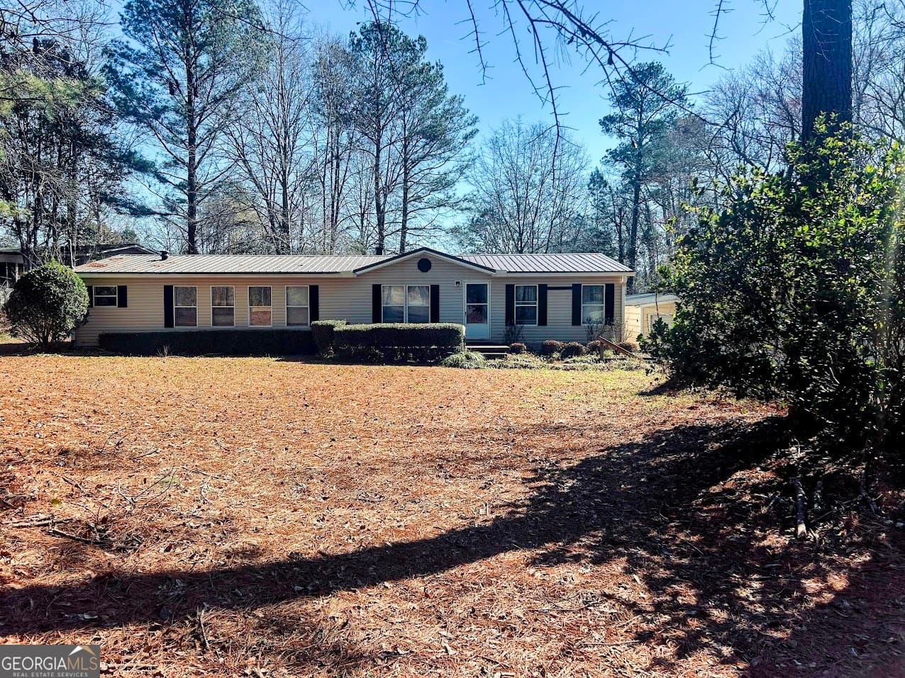 3 bedroom, 2 bathroom, 1,800 sq ft manufactured home,single family residence for sale at 156 Flatrock Road, Eatonton, GA 31024 — photo 1 of 33