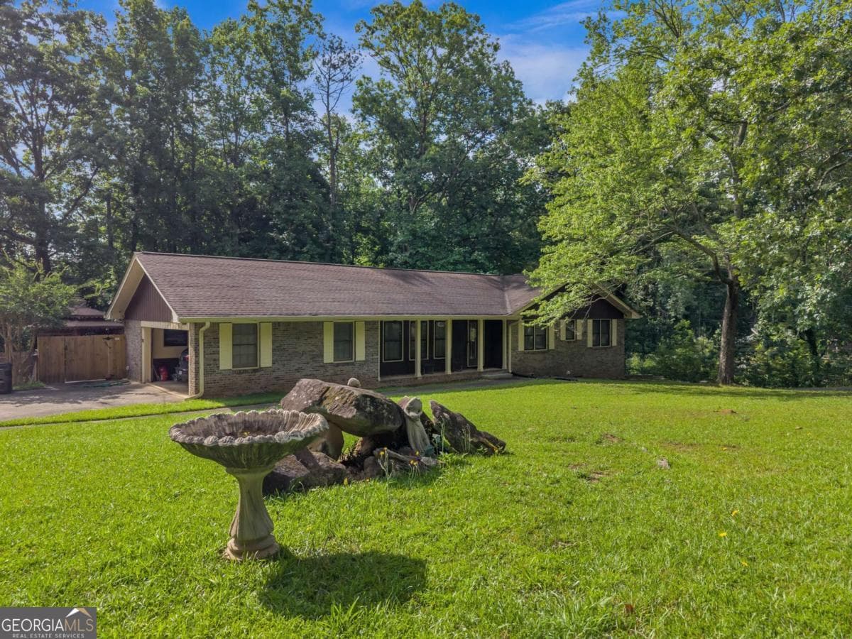 4 bedroom, 3 bathroom, 1,758 sq ft single family residence sold at 6238 Forrest Avenue, Union City, GA 30291