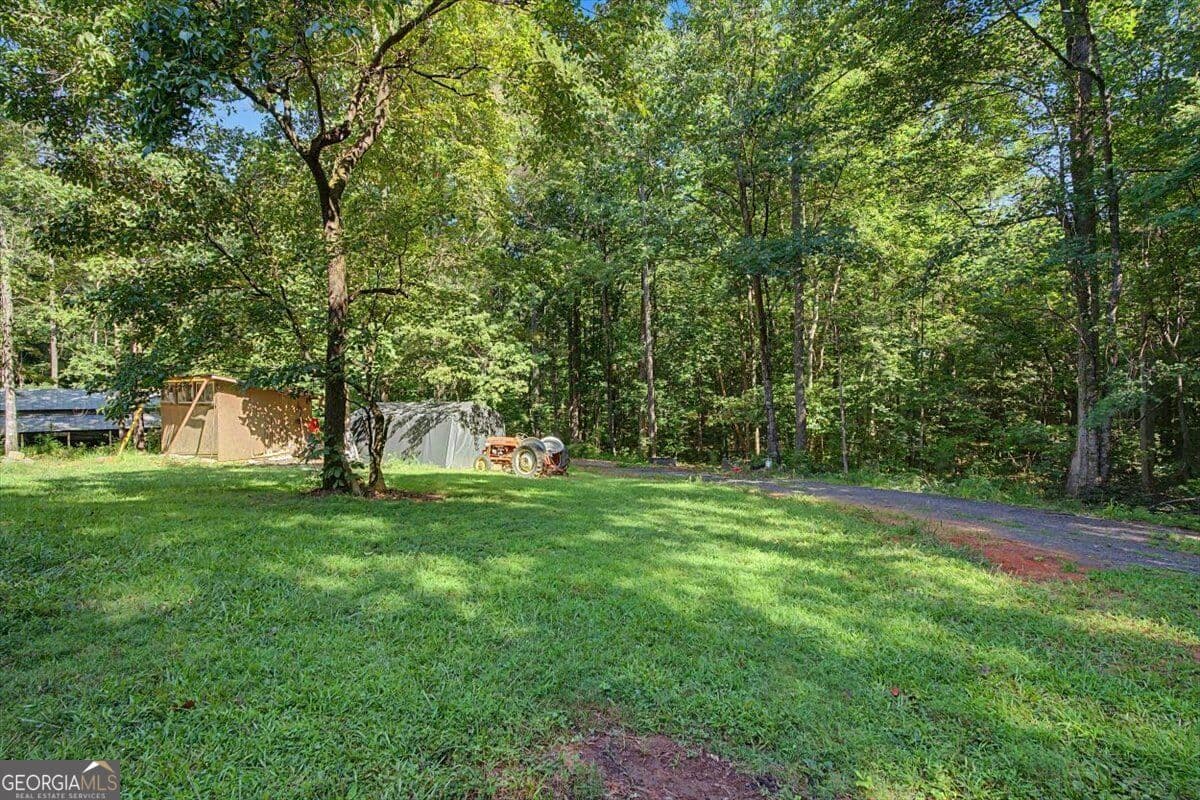 residential lot for sale at 10589 Cumming Highway, Canton, GA 30115 — photo 7