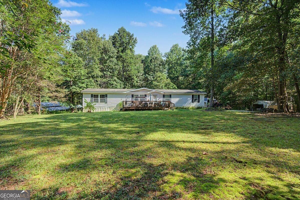 residential lot for sale at 10589 Cumming Highway, Canton, GA 30115 — photo 1 of 18