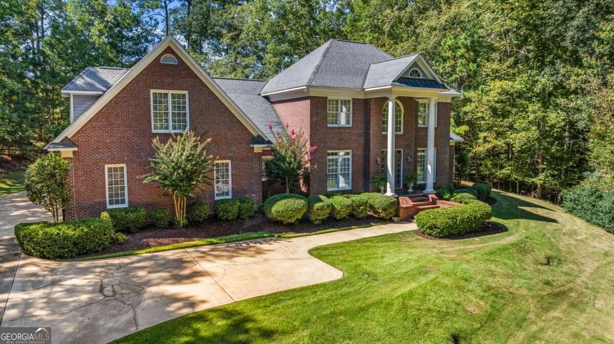 6 bedroom, 4.5 bathroom, 4,999 sq ft single family residence for sale at 1254 Rocky Shoals Drive, Midland, GA 31820 — photo 2