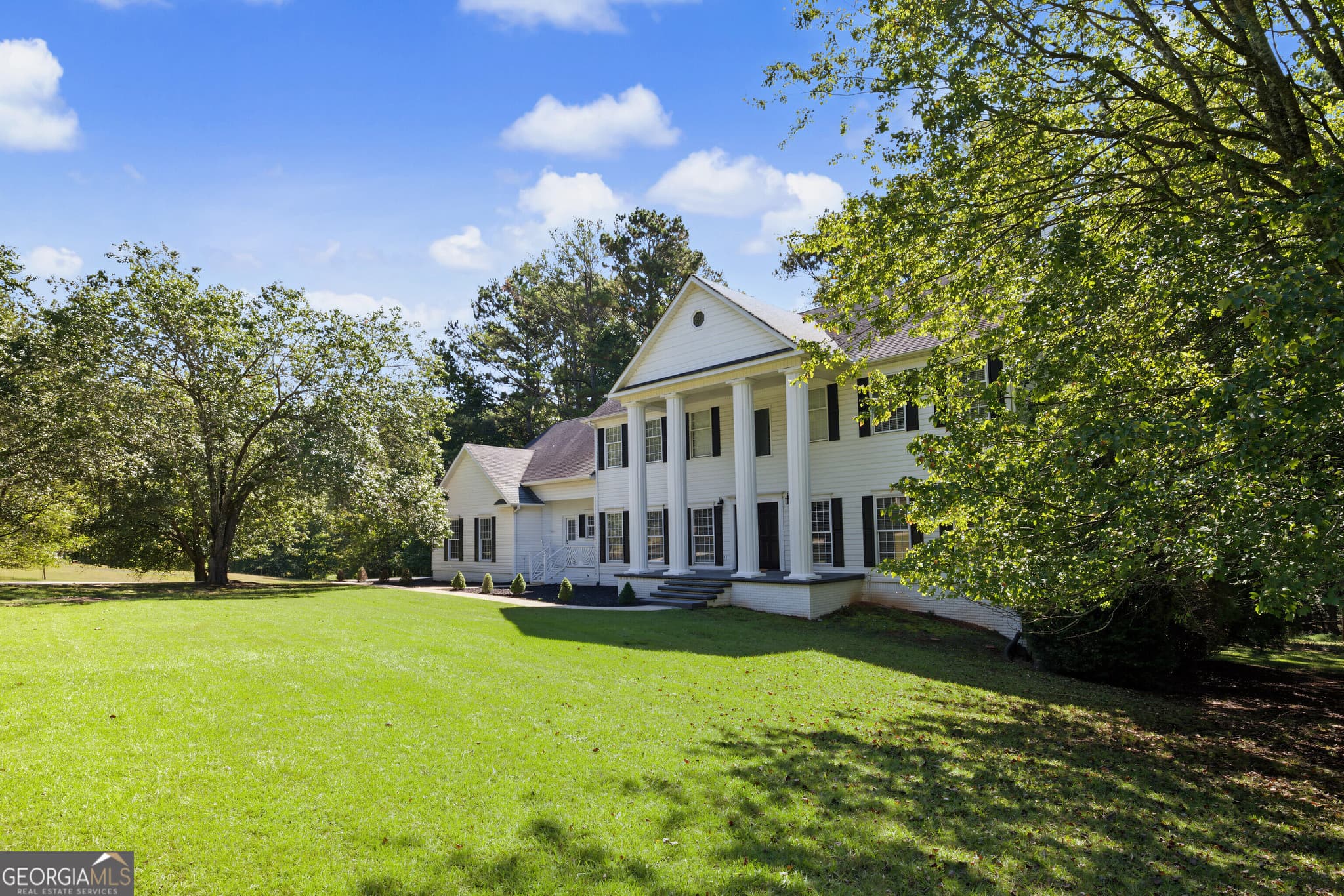 4 bedroom, 4 bathroom, 3,929 sq ft single family residence for sale at 266 Ebenezer Church Road, Fayetteville, GA 30215 — photo 2