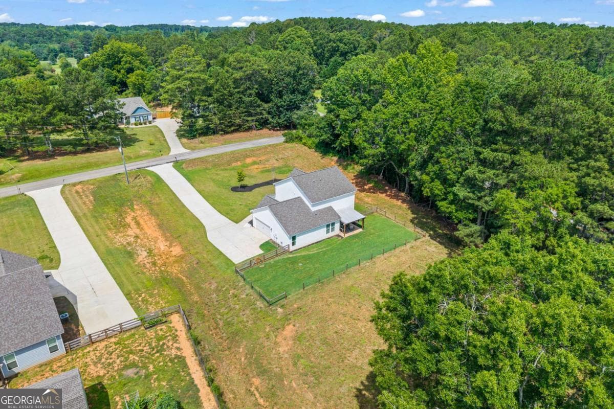 4 bedroom, 3 bathroom, 2,579 sq ft single family residence for sale at 781 Cattle Barn Road, Monroe, GA 30656 — photo 2