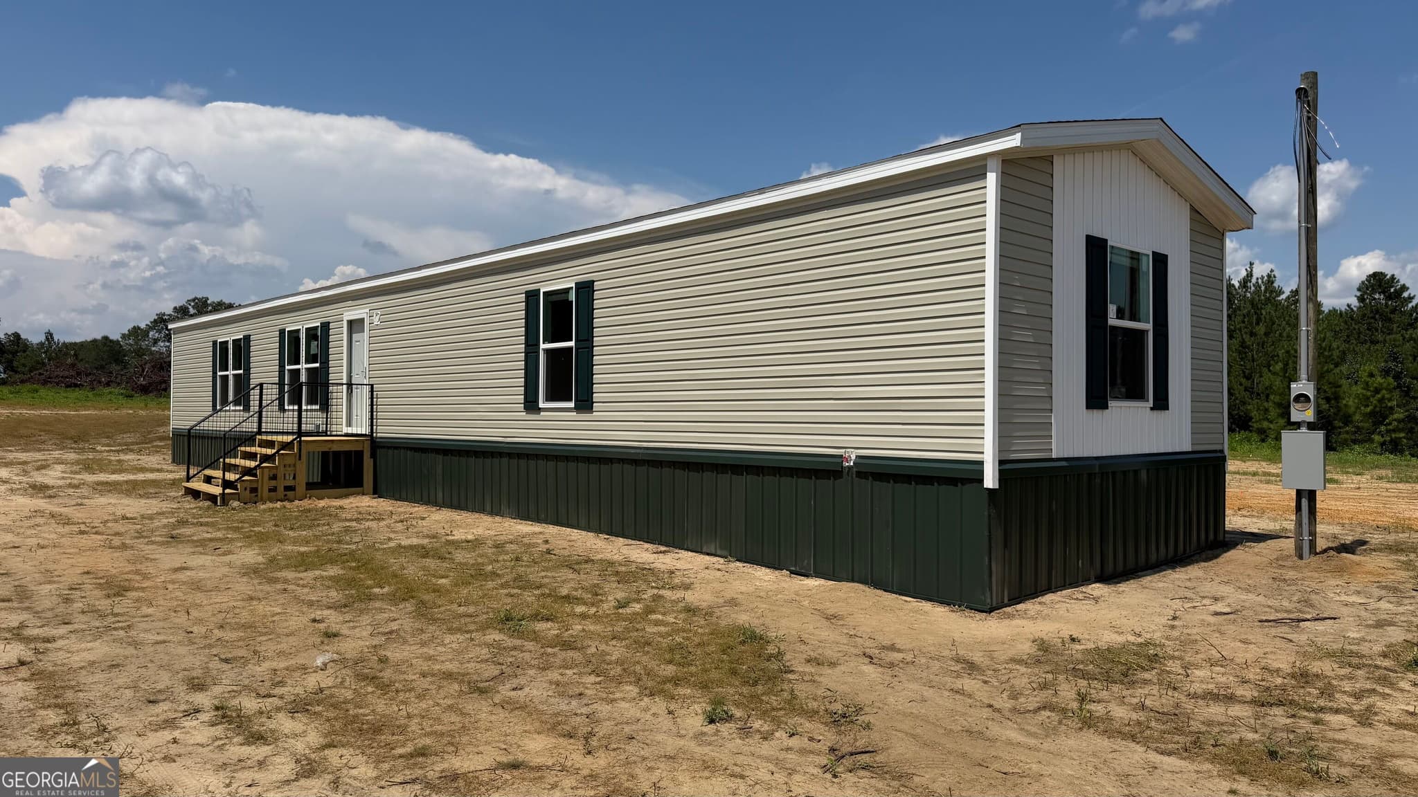 3 bedroom, 2 bathroom, 1,280 sq ft manufactured home,single family residence under contract at 944 Collins Lane, Rentz, GA 31075 — photo 2