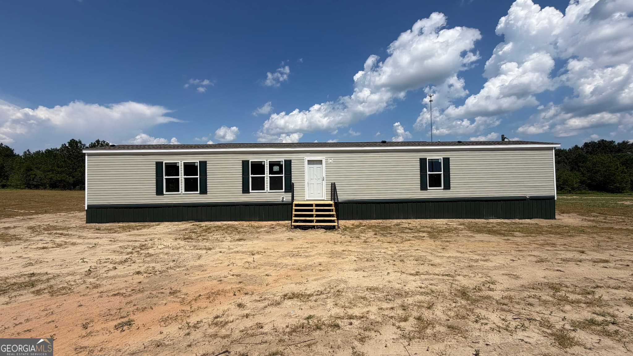 3 bedroom, 2 bathroom, 1,280 sq ft manufactured home,single family residence under contract at 944 Collins Lane, Rentz, GA 31075 — photo 3