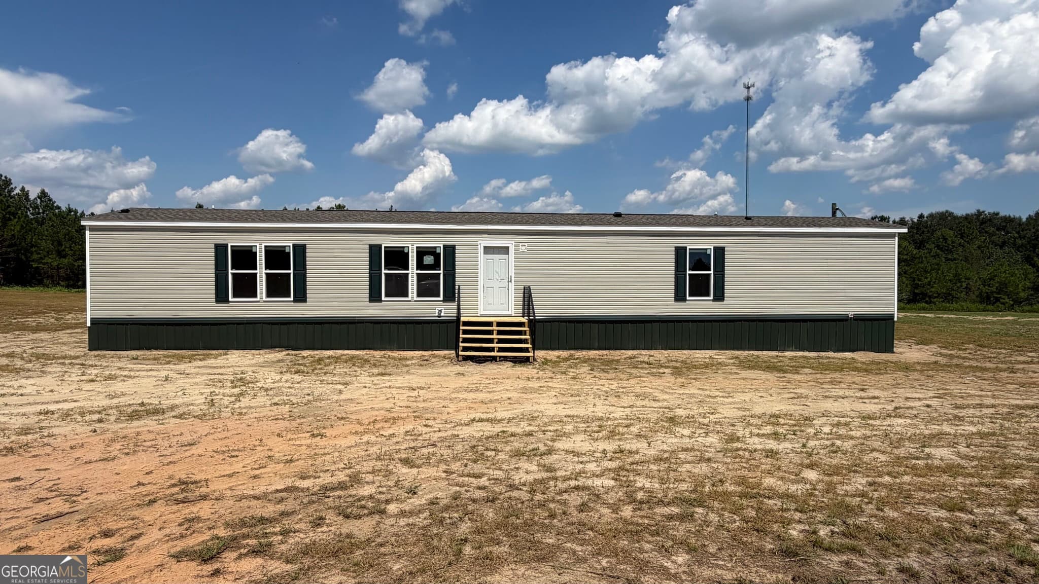 3 bedroom, 2 bathroom, 1,280 sq ft manufactured home,single family residence under contract at 944 Collins Lane, Rentz, GA 31075