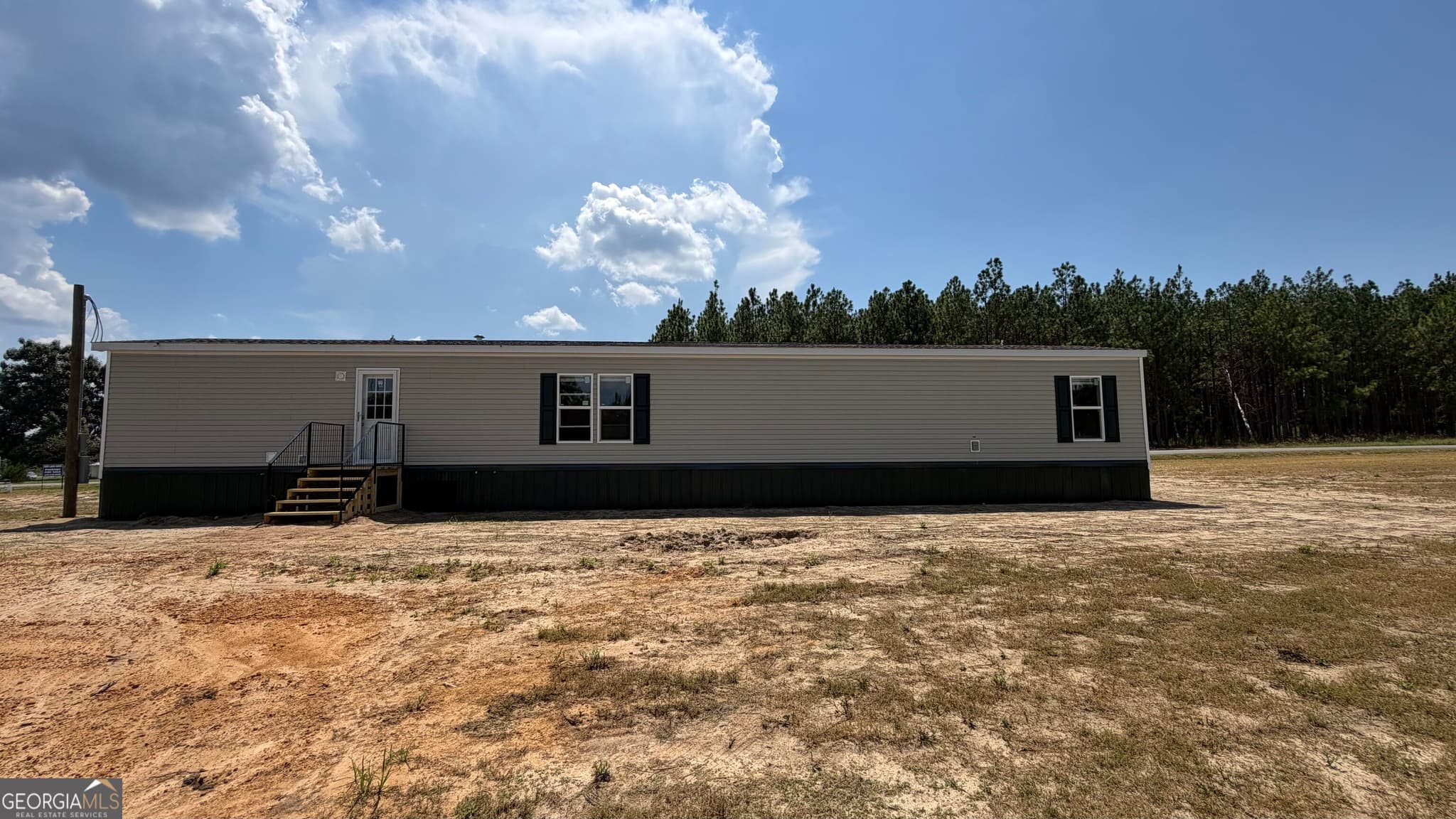3 bedroom, 2 bathroom, 1,280 sq ft manufactured home,single family residence under contract at 944 Collins Lane, Rentz, GA 31075 — photo 5