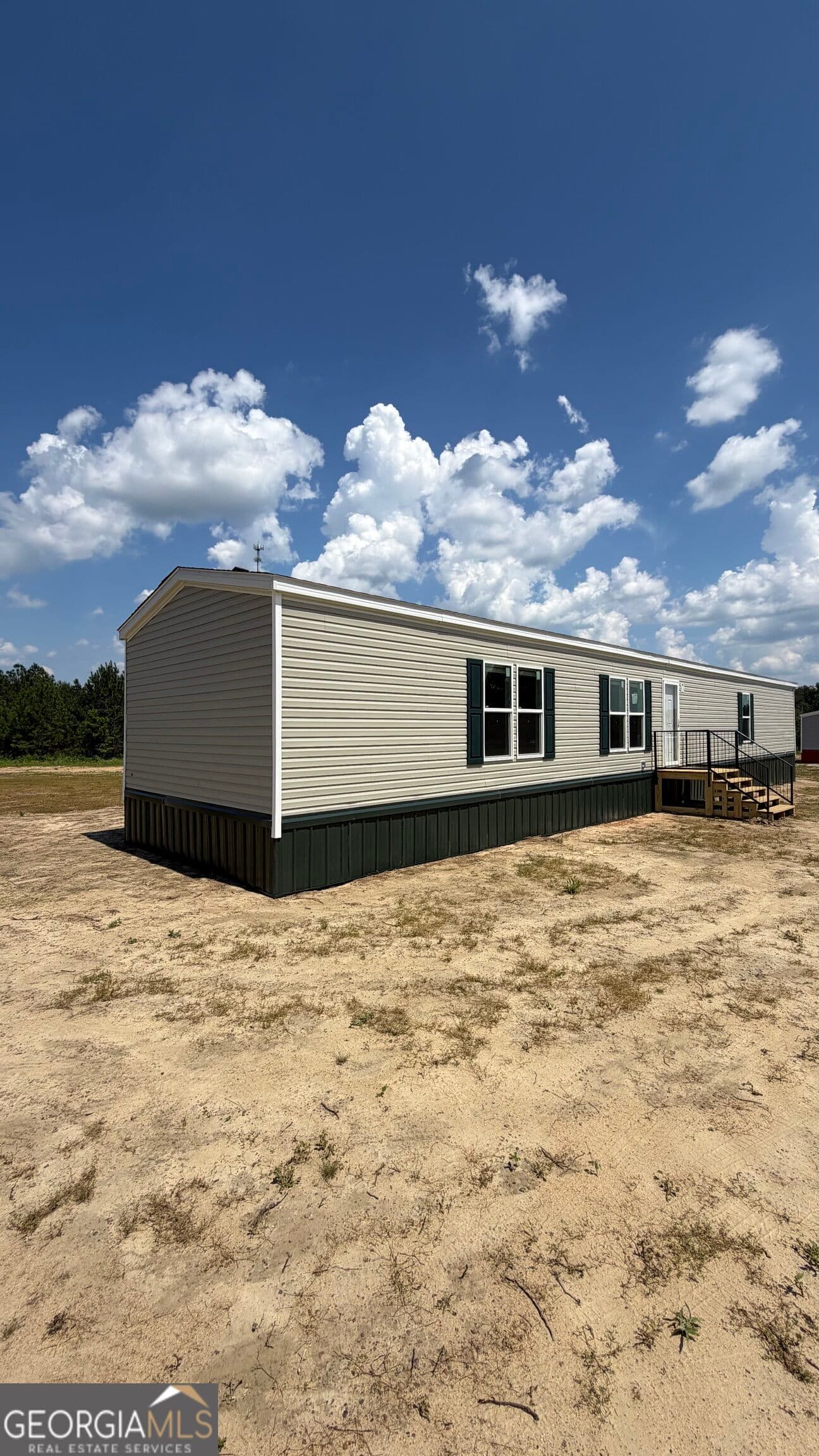 3 bedroom, 2 bathroom, 1,280 sq ft manufactured home,single family residence under contract at 944 Collins Lane, Rentz, GA 31075 — photo 4