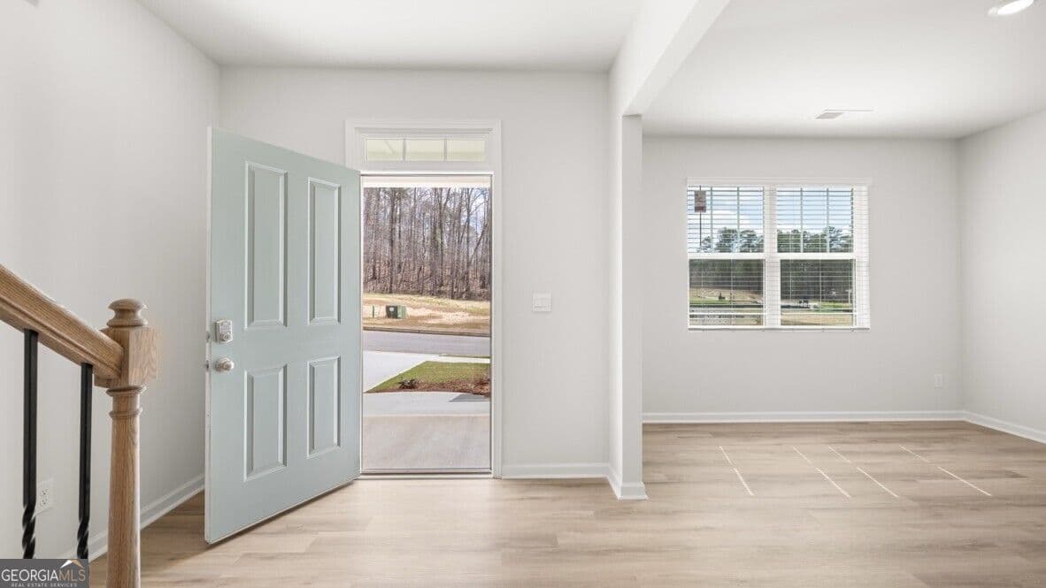 5 bedroom, 3 bathroom, 3,209 sq ft single family residence for sale at 6063 Airedale Drive, Union City, GA 30291 — photo 3