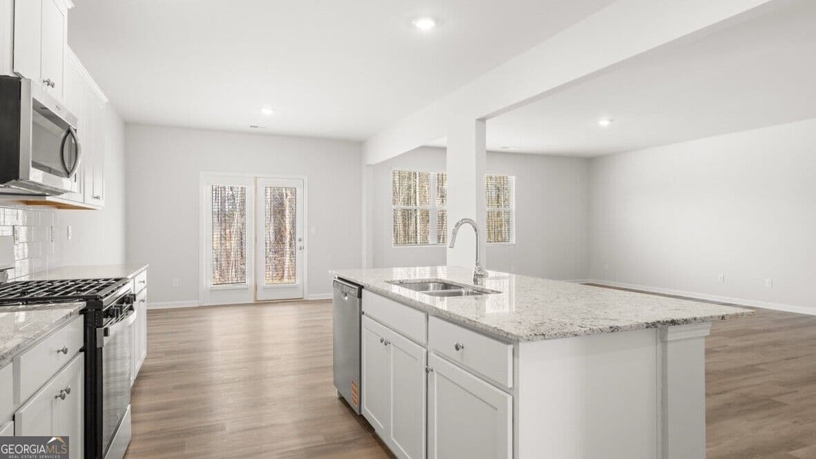 5 bedroom, 3 bathroom, 3,209 sq ft single family residence for sale at 6063 Airedale Drive, Union City, GA 30291 — photo 9