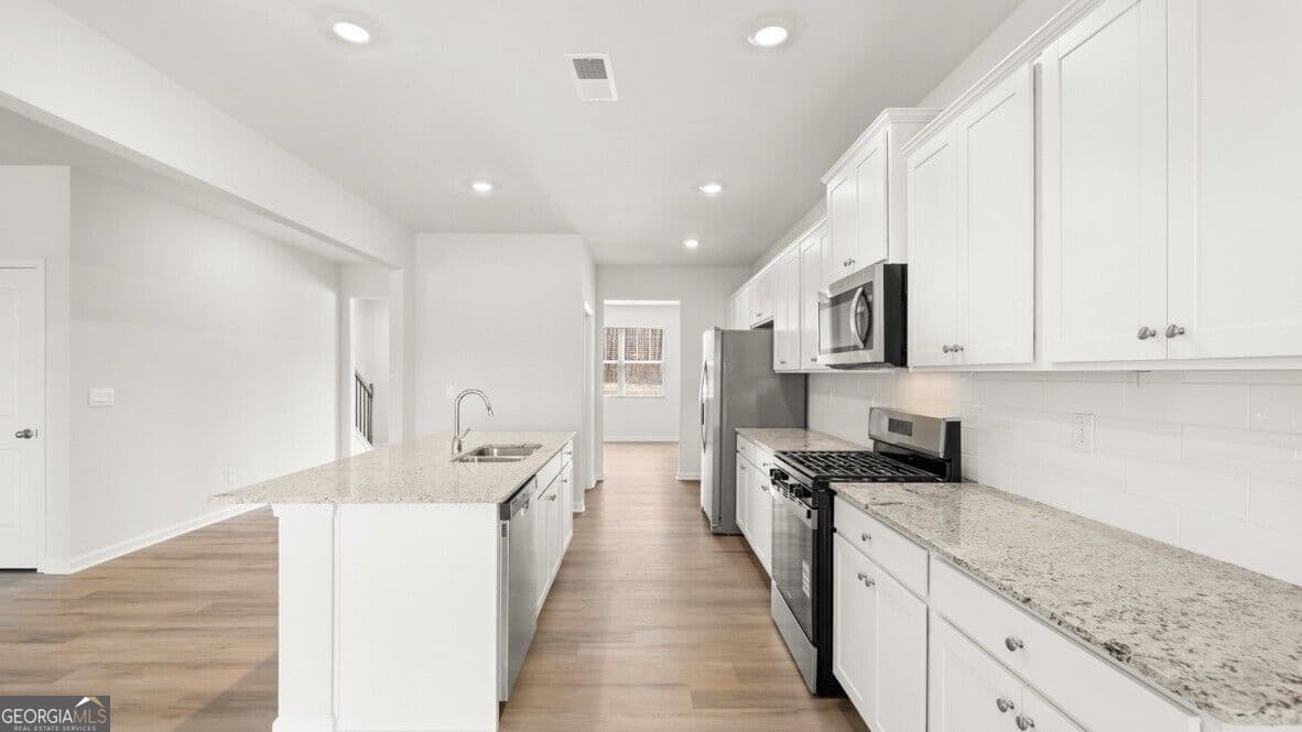 5 bedroom, 3 bathroom, 3,209 sq ft single family residence for sale at 6063 Airedale Drive, Union City, GA 30291 — photo 10
