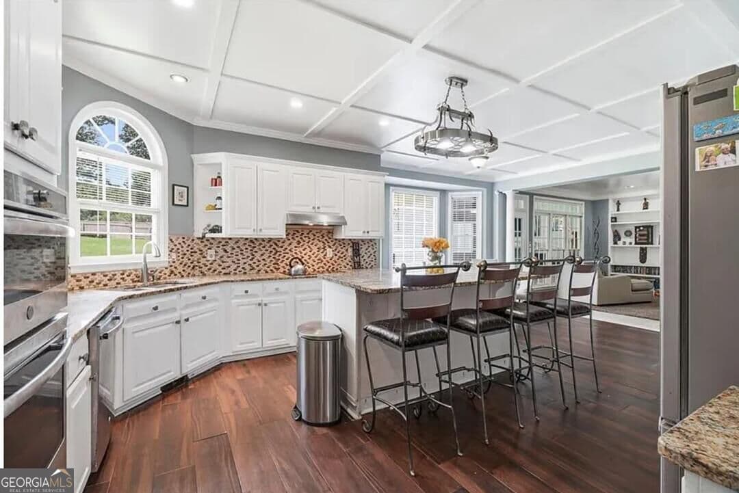 7 bedroom, 4.5 bathroom, 3,575 sq ft single family residence for sale at 9291 Carillon Court, Jonesboro, GA 30236 — photo 6