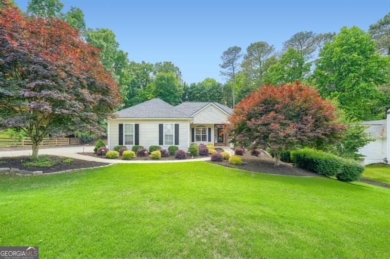 3 bedroom, 3 bathroom, 2,385 sq ft single family residence sold at 7145 Berry Patch Drive, Cumming, GA 30040