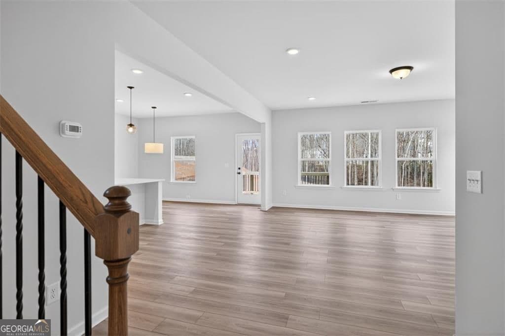 4 bedroom, 2.5 bathroom, 2,565 sq ft single family residence for sale at 550 Grover Street, Hoschton, GA 30548 — photo 6