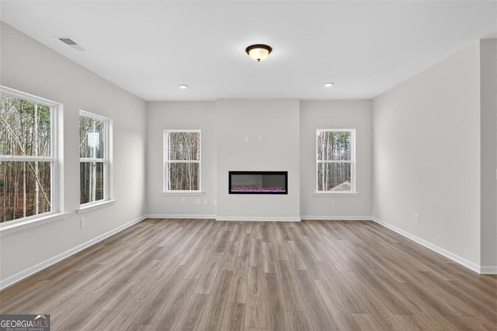 4 bedroom, 2.5 bathroom, 2,565 sq ft single family residence for sale at 550 Grover Street, Hoschton, GA 30548 — photo 7
