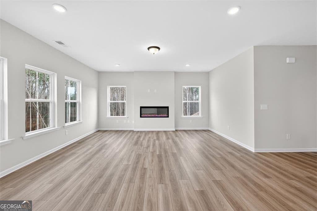 4 bedroom, 2.5 bathroom, 2,565 sq ft single family residence for sale at 550 Grover Street, Hoschton, GA 30548 — photo 10